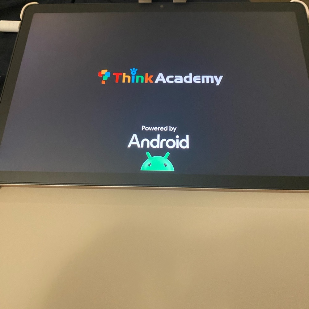 Android Tablet with Cream Cover - AI Think Academy